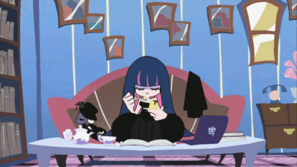 a GIF of Stocking bringing a spoonful of pudding to her mouth, then shivering in ecstasy and blushing, she emits a orangey red heart.